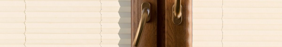 Wooden textured U PVC, plastic two wings window with fabric blinds and golden handles Pomiar i cena fotolia